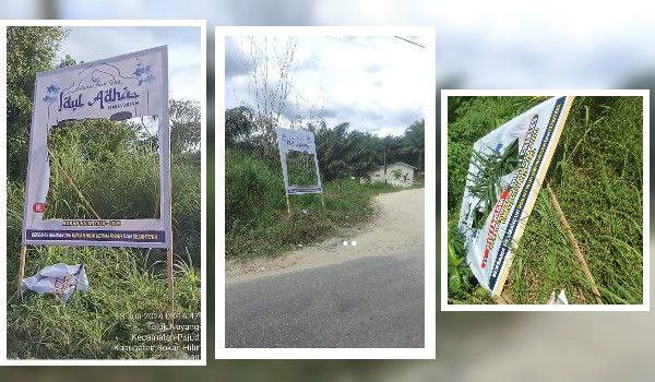 Baliho Bacalon Bupati Rohil H Bistamam -Jhon Charles Dirusak